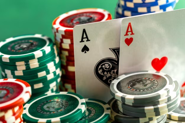 Close-up of Kembang Kempis betting layout with card shoe and dealer hands
